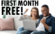 A woman and man sitting on a couch with a laptop, pumping their fists in the air. With the text, "First Month Free!"